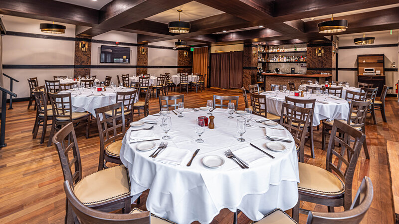 Onyx Room with view of set tables and private bar