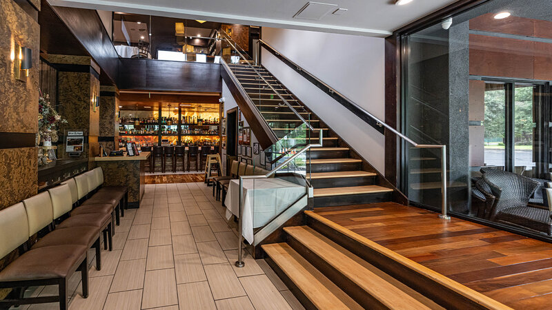 Waiting area with staircase to upstairs